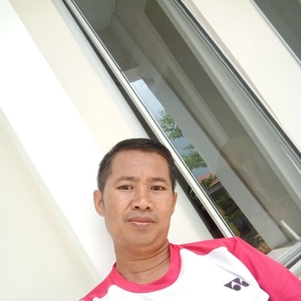 Masdarsjam - Guru bulu tangkis - Mario Riawa
