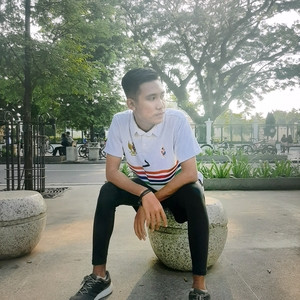 Malik - Guru bulu tangkis - Yogyakarta
