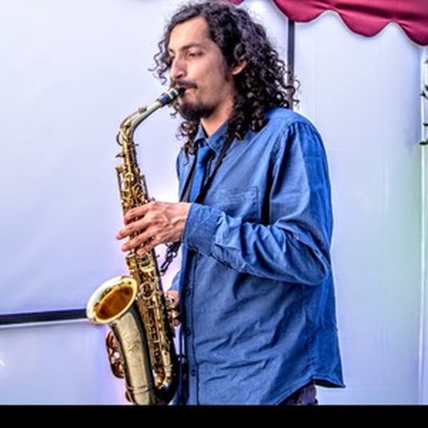 Claudio - prof de armónica - Curicó