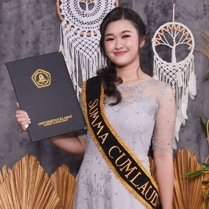 Viani - Guru ekonomi - Kota Manado