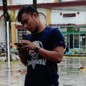 Muhammad - Guru bulu tangkis - Lubuk Begalung