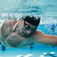 Entrenador titulado y Ex nadador Olimpico da clases  particulares de de natacion