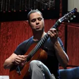Carlos - Prof de viola - São Paulo