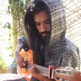 Mohamed Taha - professeur de guitare - Four Corners
