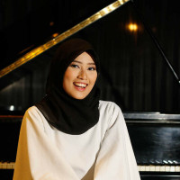 Pianist-composer offers piano lessons from home. Free music sheet to any song you want to play, tailored to your skill!