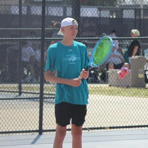 Logan - Tennis coach - Garden City