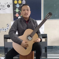 I did my grade 8 in Classical Guitar ABRSM Board. I had been playing Guitar for more than 15 years and I am comfortable to teach acoustic and classical guitar.