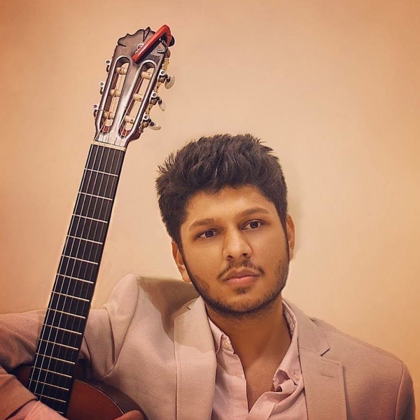 Concert Guitarist with Graduate Diploma in Guitar Performance (LTCL) from Trinity College London. Teaching Classical Guitar and Music Theory