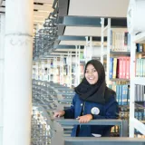 Elly - Guru ekonomi - Surabaya